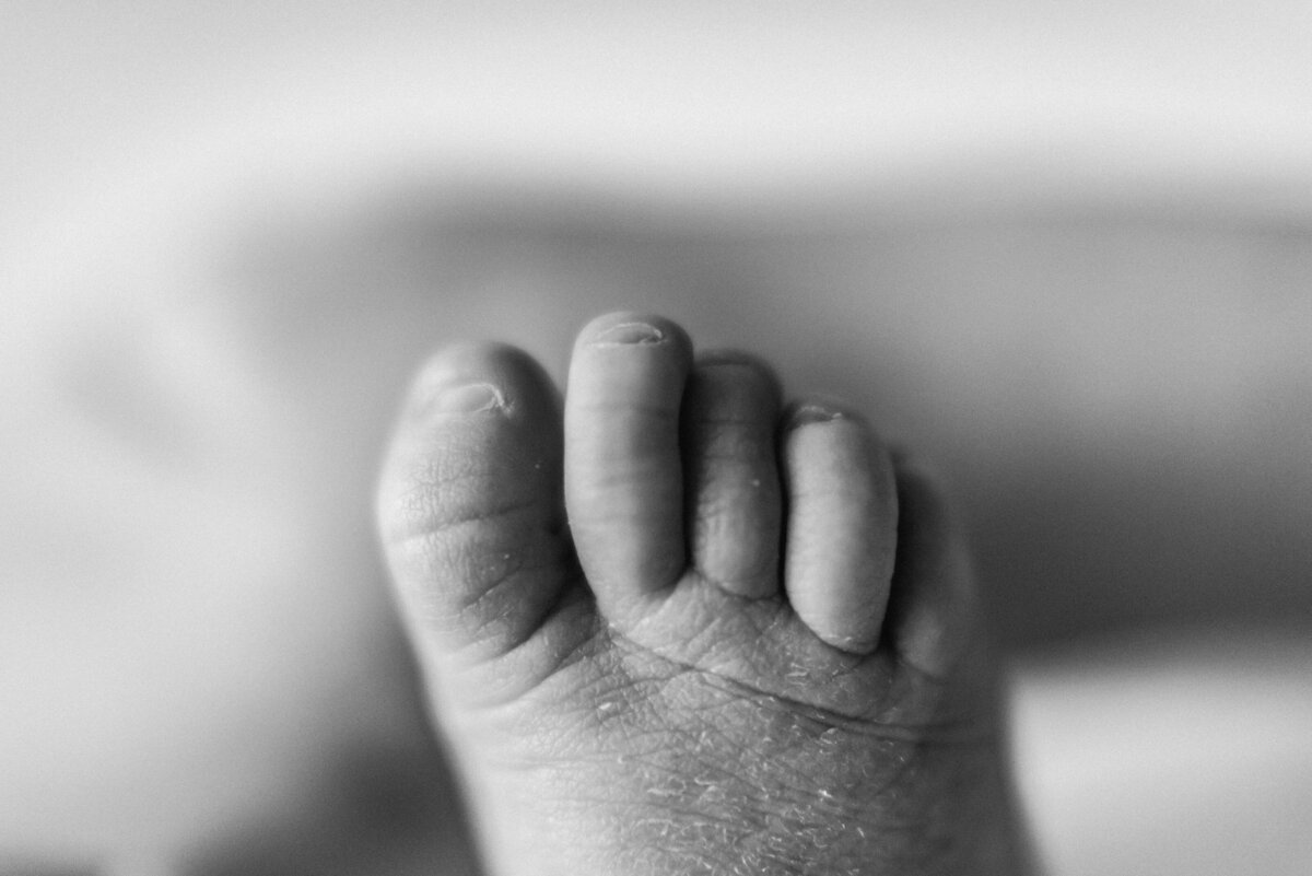 A babies foot in newborn photoshoot in Billingshurst
