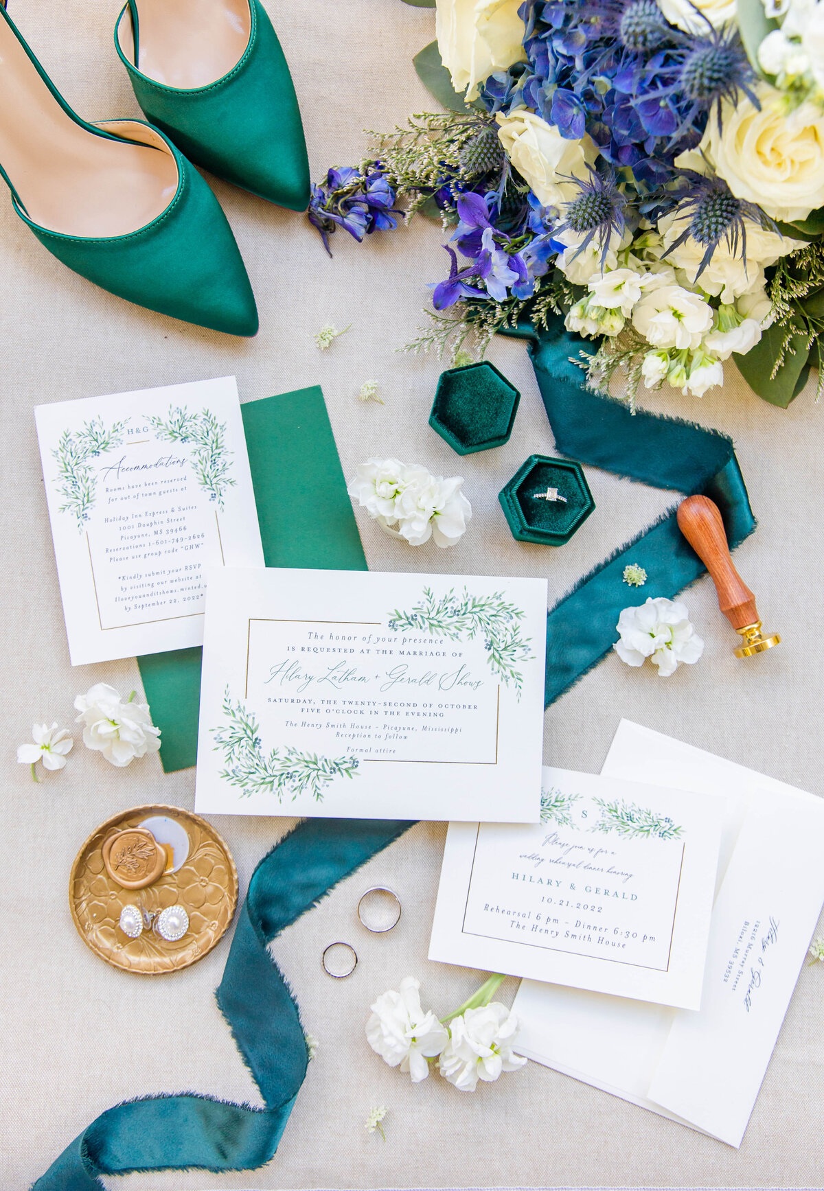 wedding day details with shades of emerald green, white and gold