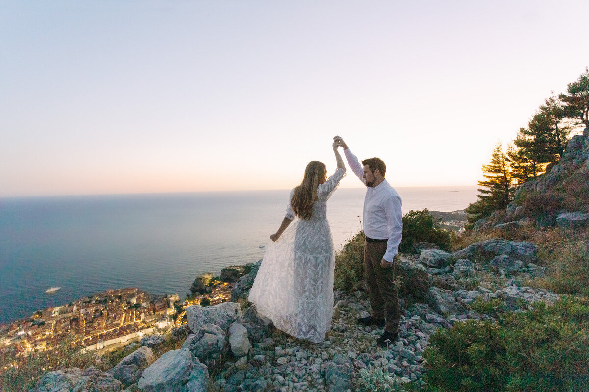 dancing on top of dubrovnik mountain for honeymoon photos in croatia