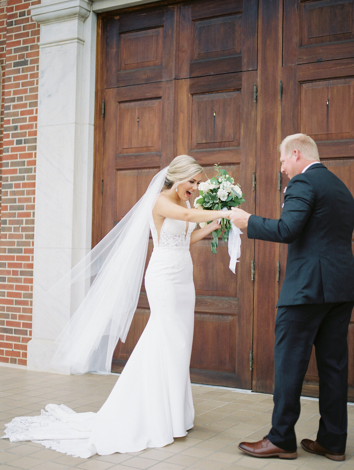 A bride and groom share a first look at a church by Chattanooga wedding photographer, Kelsey Dawn Photography