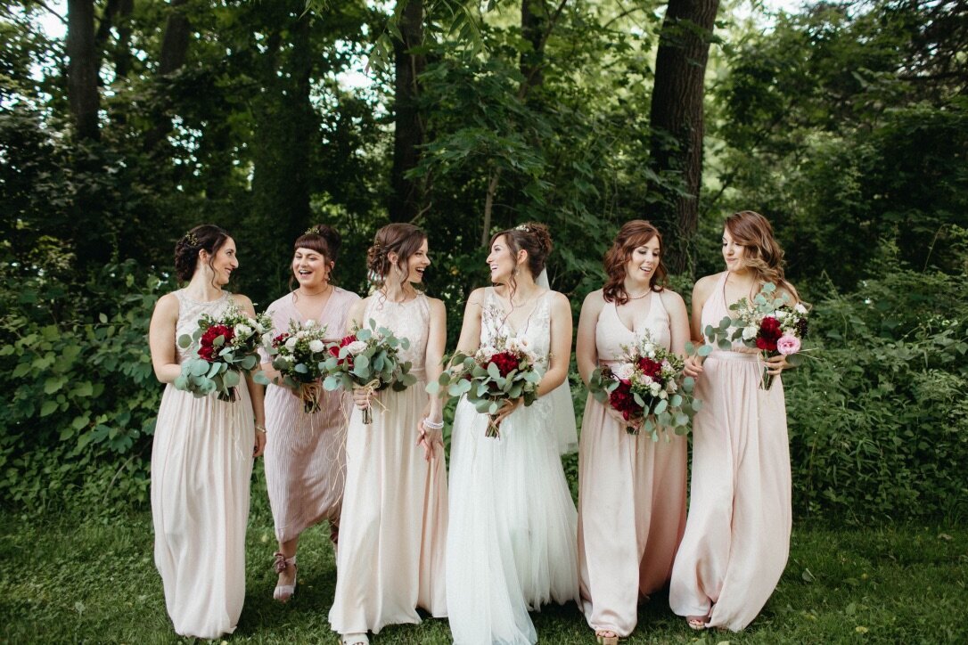 Bride and bridesmaids with beautiful hair and makeup