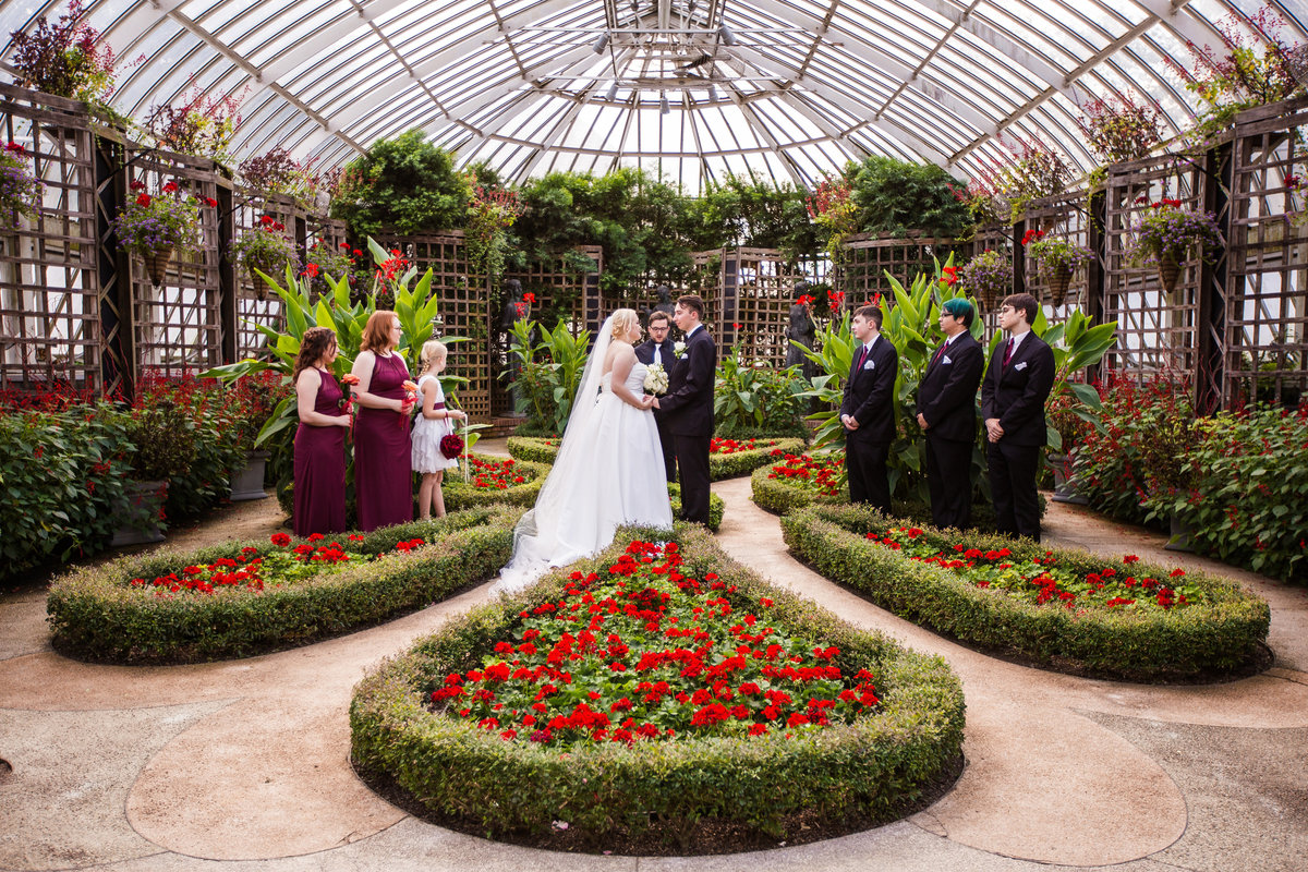 Wedding ceremony in the Broderie Room of Phipps Conservatory