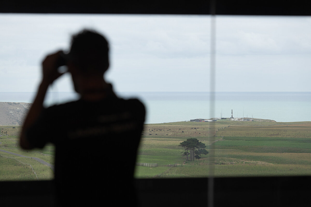 Launch Safety officer maintains the saety perimeter for Electron's launch by surveying through binoculars.