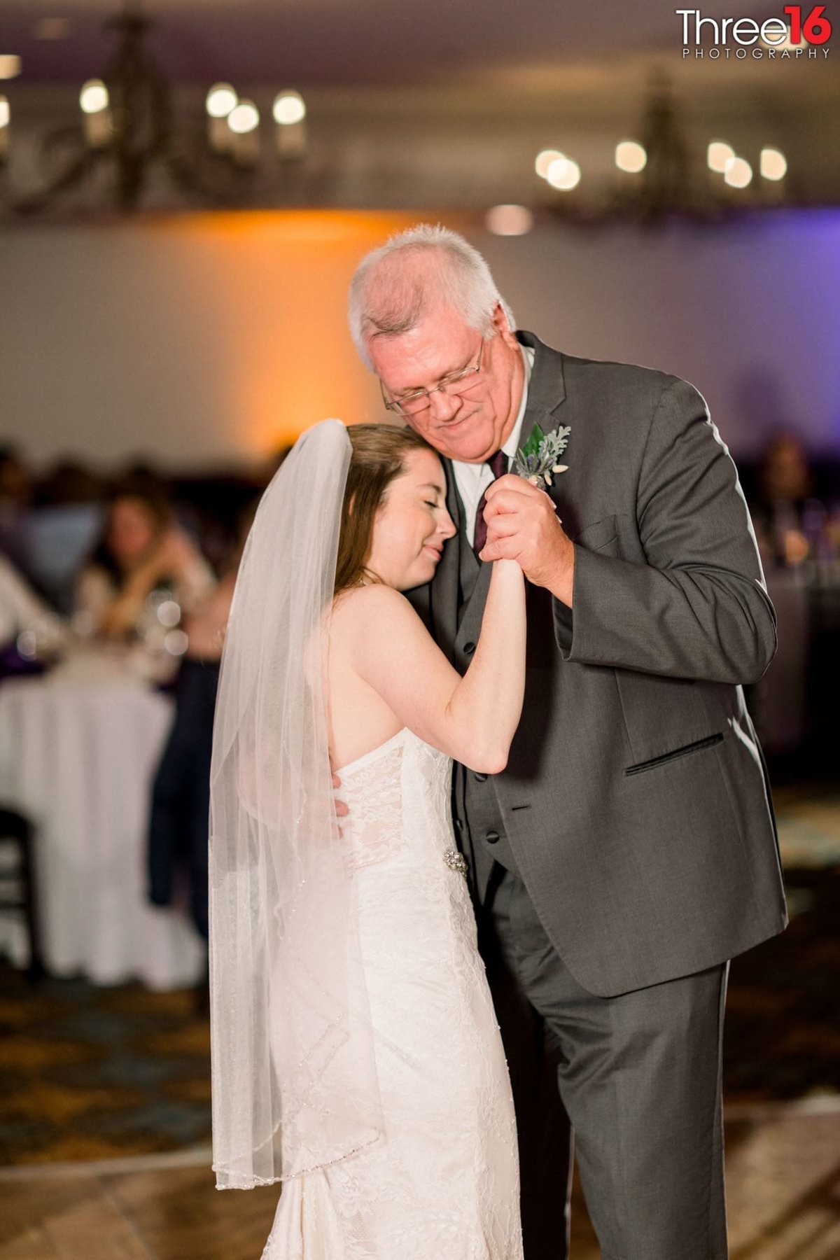 Bride dances with her father at her reception