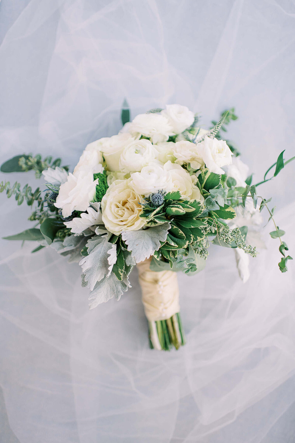 Elegant white rose bouquet for wedding in Texas hill country