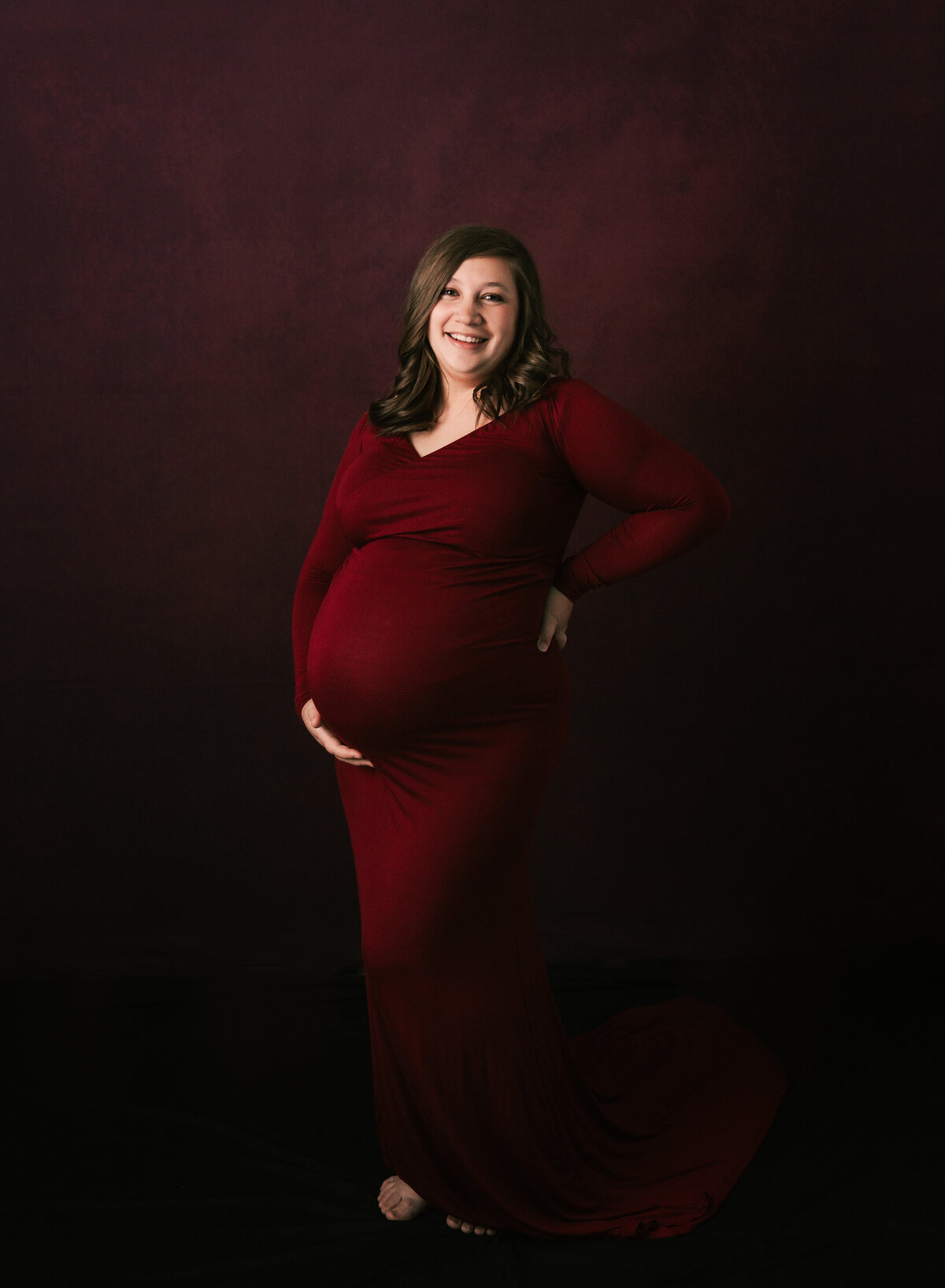 A gorgeous pregnant mom during her maternity shoot at Diane Owen Photography's studio.