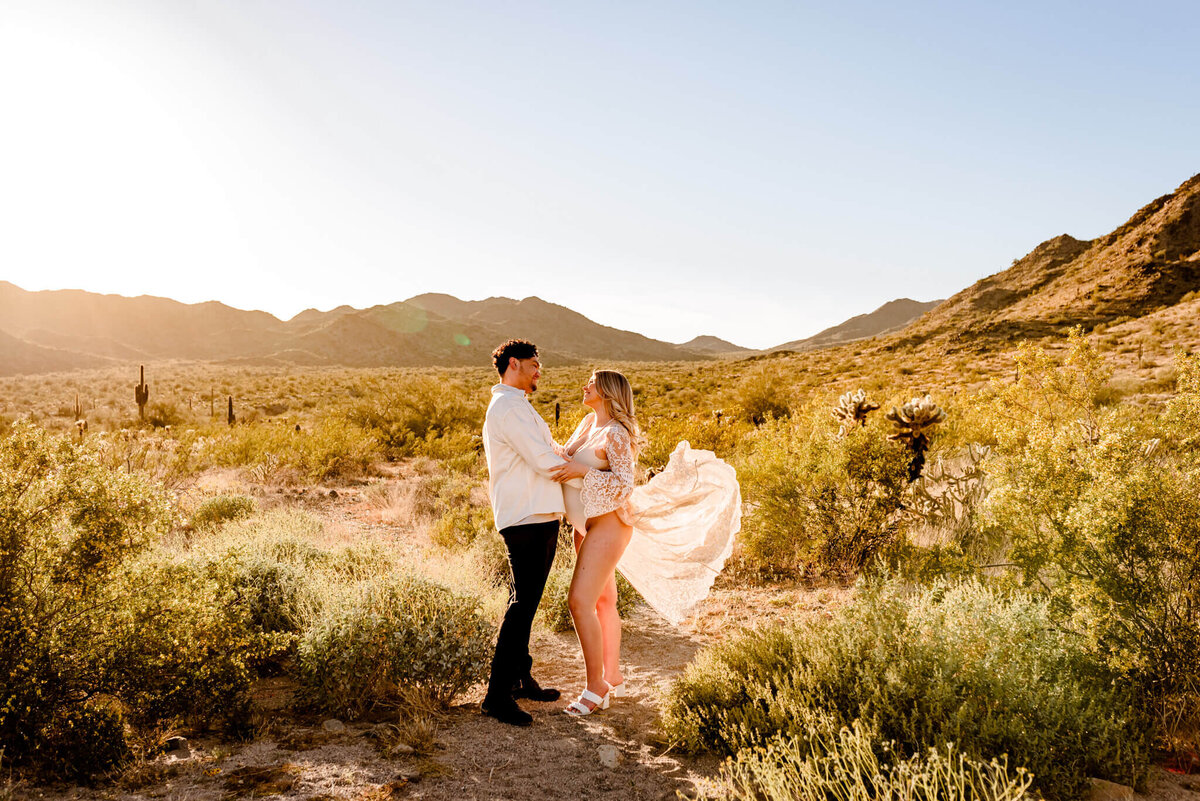 flowy dress in AZ desert for maternity parents photography session