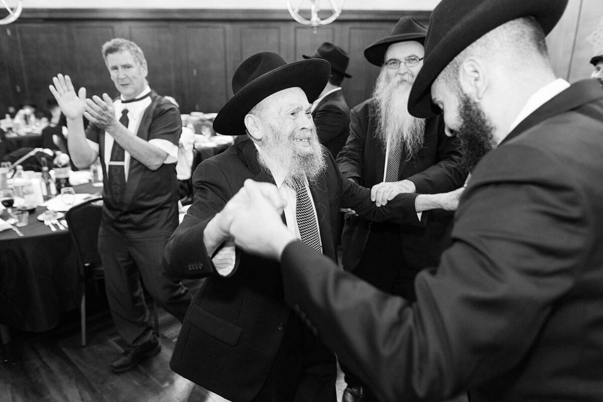 Eliana-Melmed-Photography-Chicago-LosAngeles-Jewish-WeddingPhotographer-CarmiKalman-MensDancing-00036