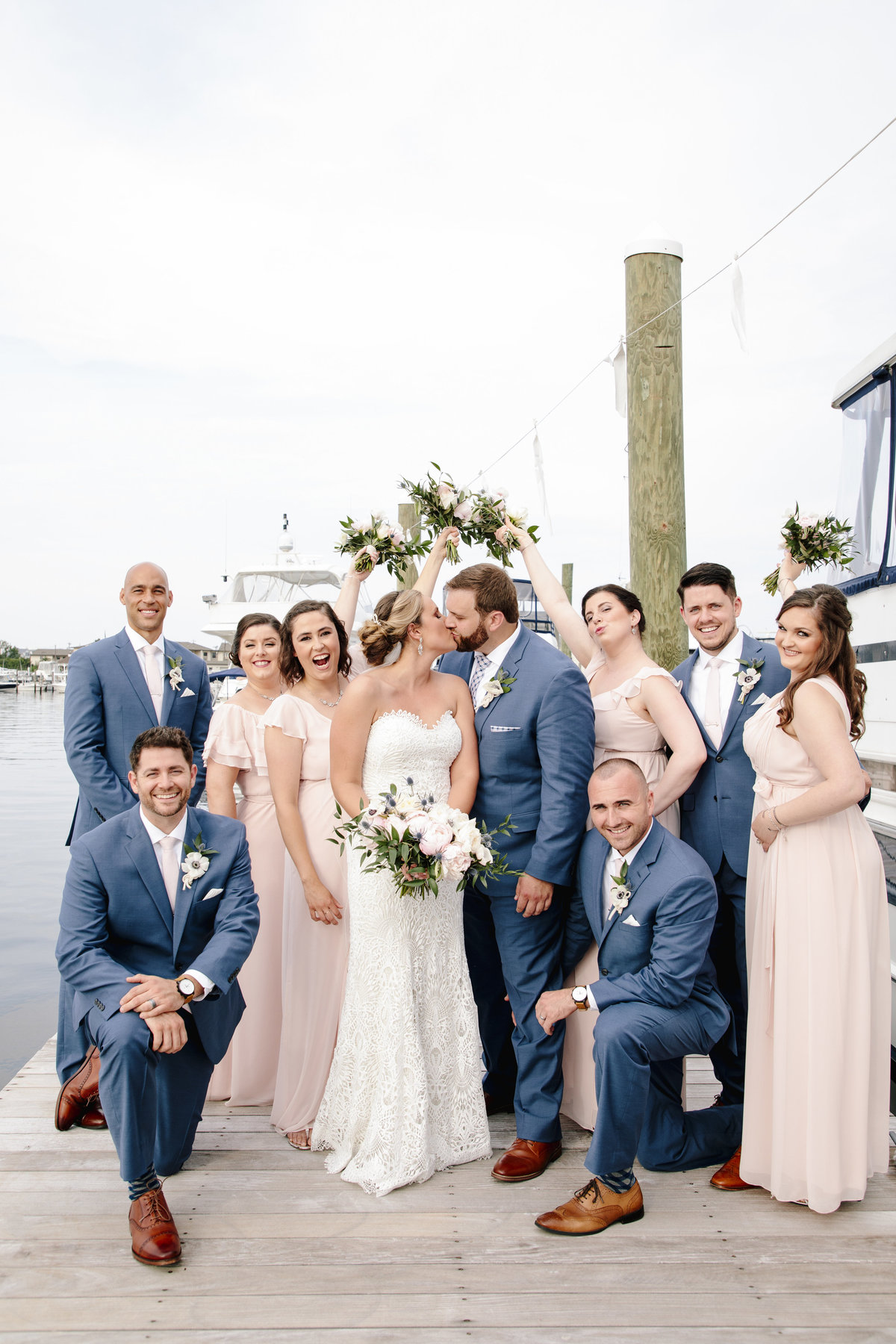 bridal party on dock at channel club wedidng