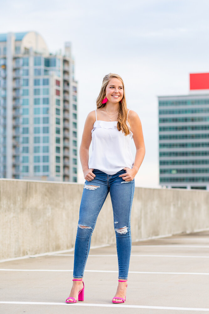 Senior portrait session on a rooftop in downtown Raleigh, NC.