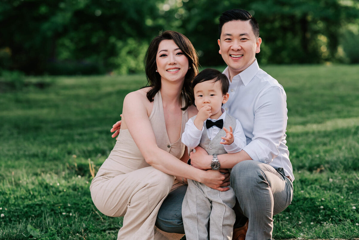 A sweet formal portrait of a nicely dressed korean family