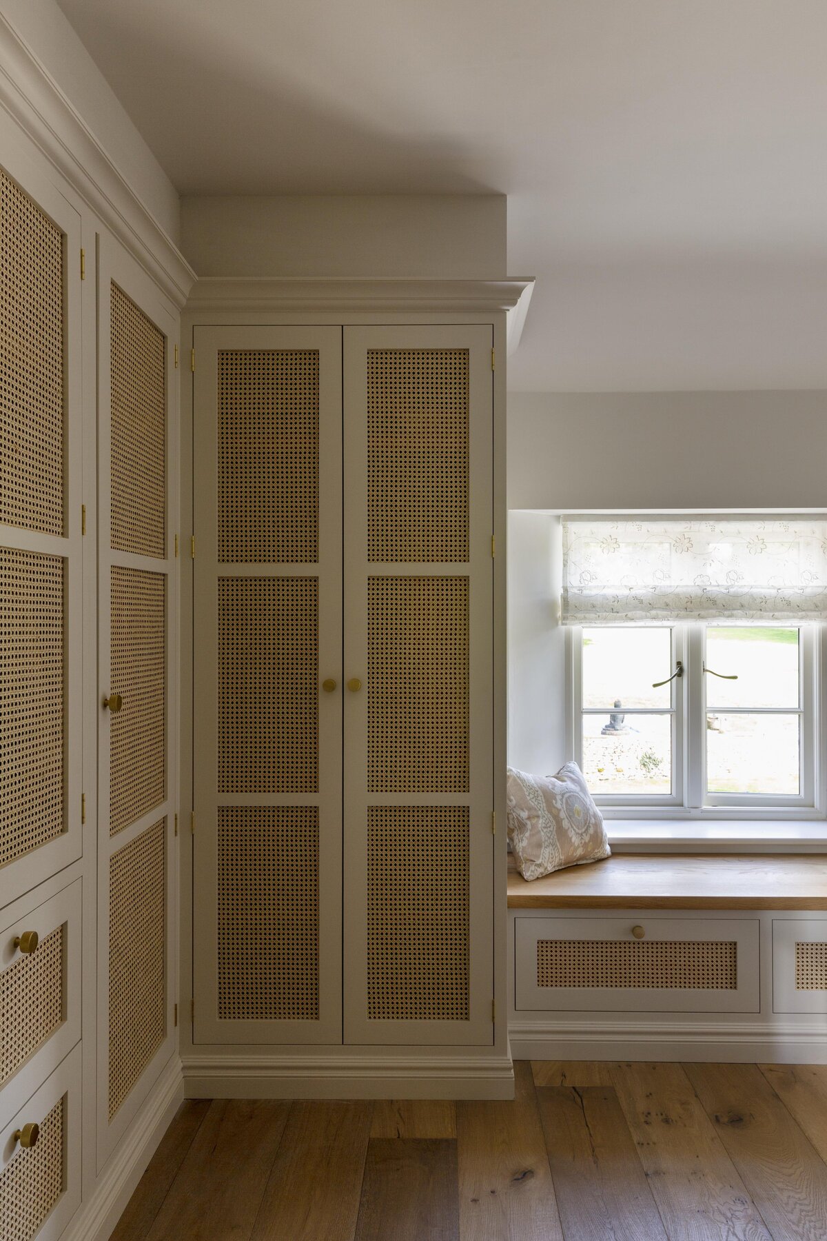 Custom fitted bedroom cabinets and window nook