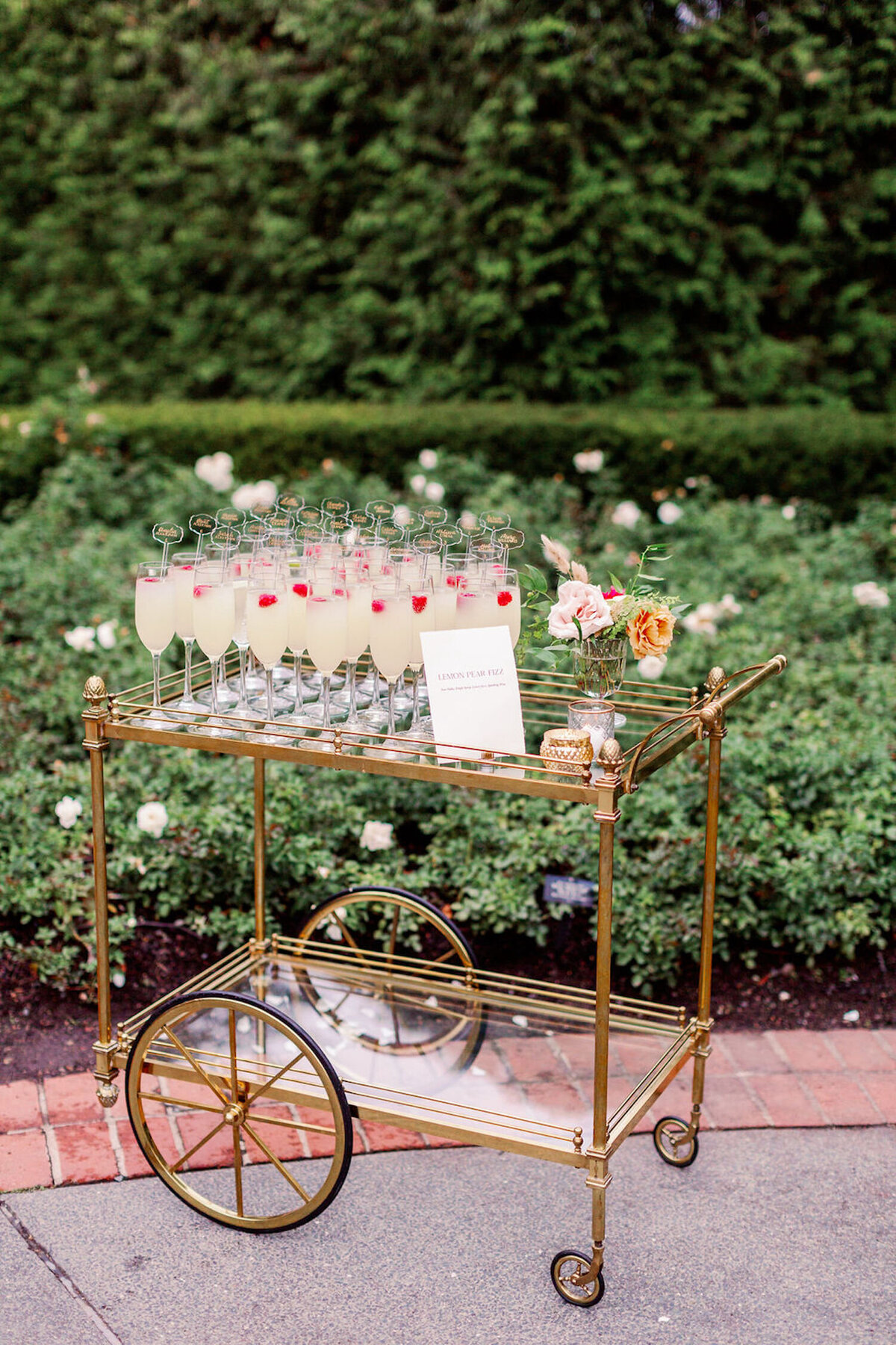 Champagne Cart Escort Card Display at Luxury Chicago North Shore Outdoor Wedding Venue
