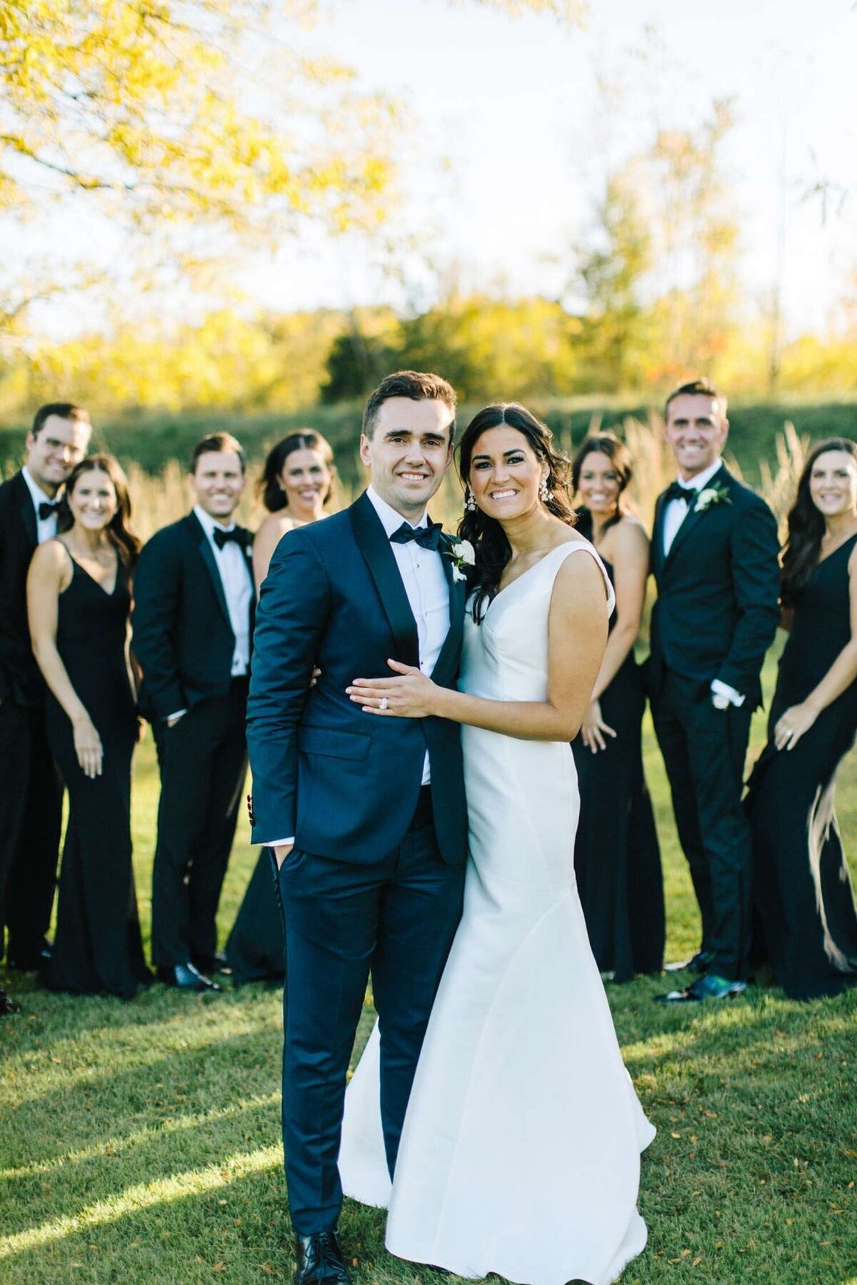Timesless and Elegant Wedding Party take Fall Portraits for a Luxury Michigan Lakefront Golf Club Wedding.