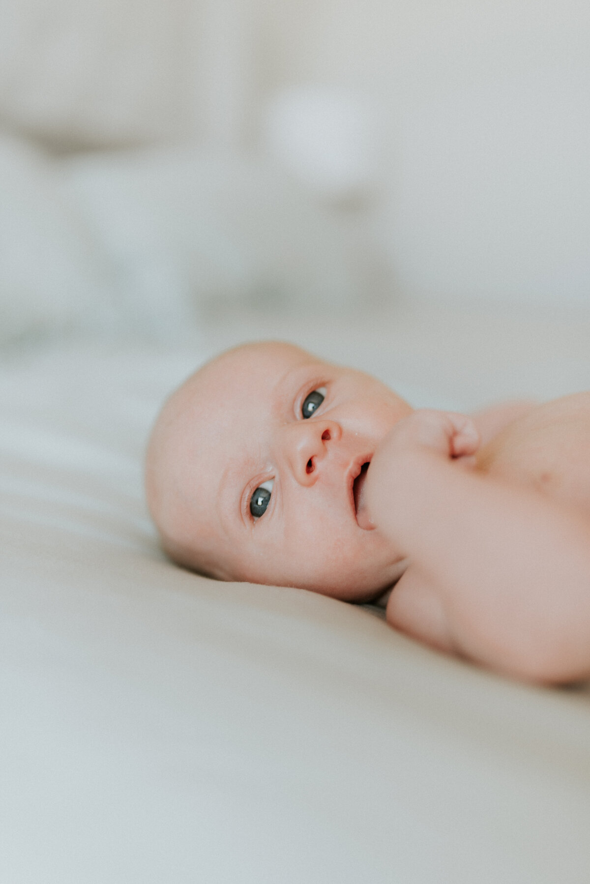 Capturing innocence with in-home newborn photography in St. Paul. Shannon Kathleen Photography creates timeless portraits that reflect the purity of your baby's early days.