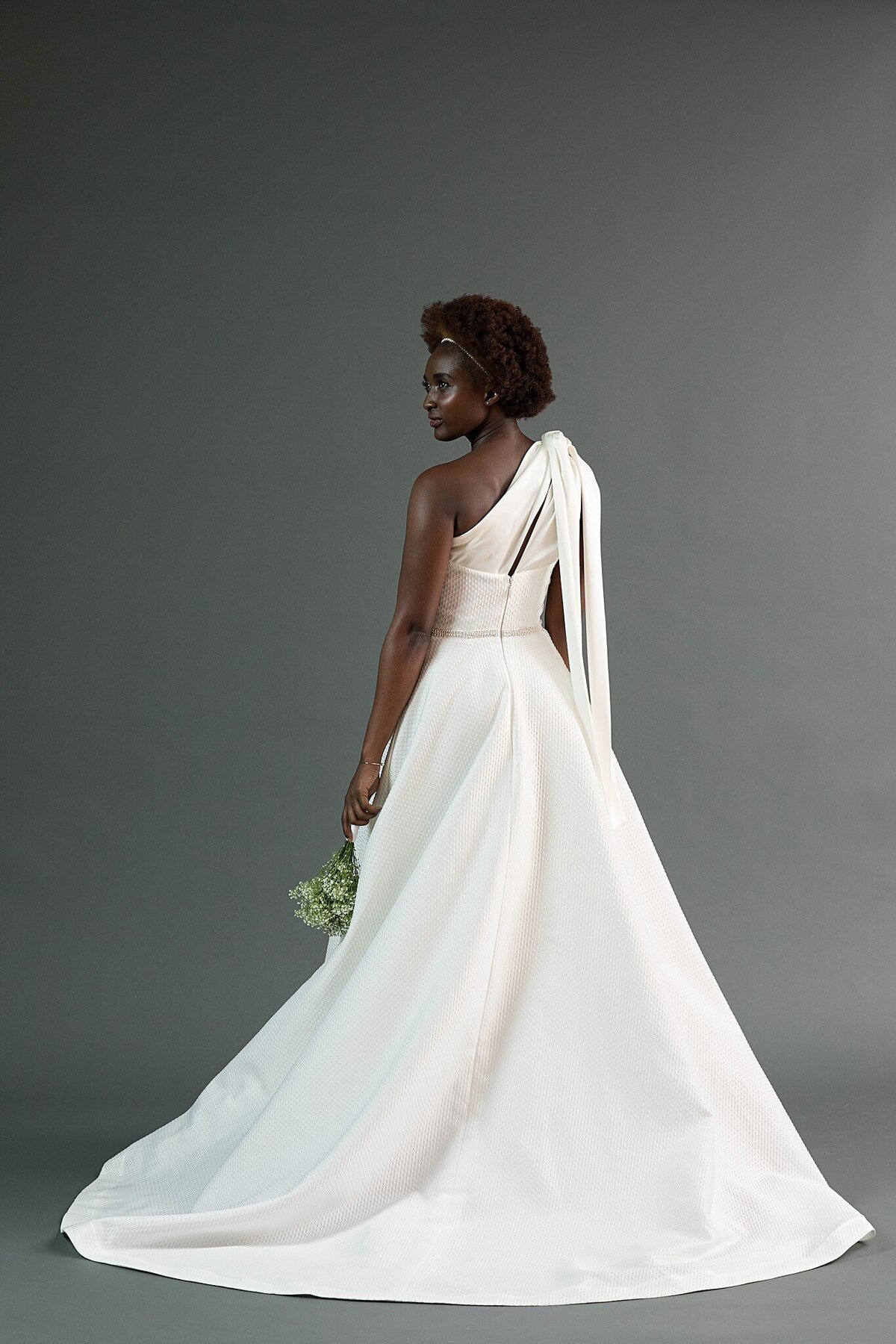 The Kimi style is a one-shoulder wedding gown is a design by indie bridal designer Edith Elan who is based in Charleston, SC.