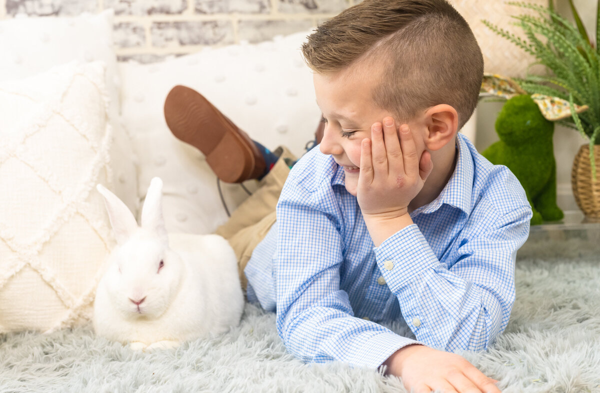 young boy with rabbit