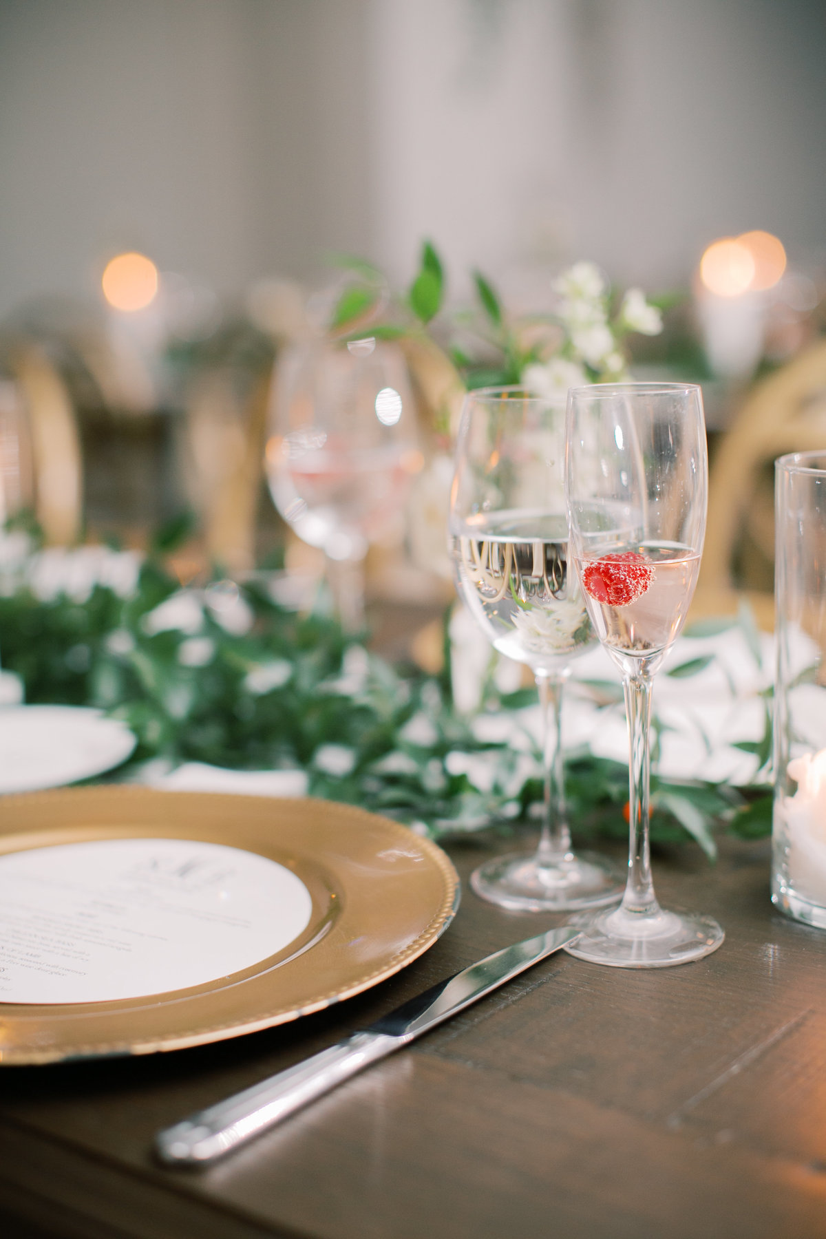 champagne glasses with gold plates and wooden tables