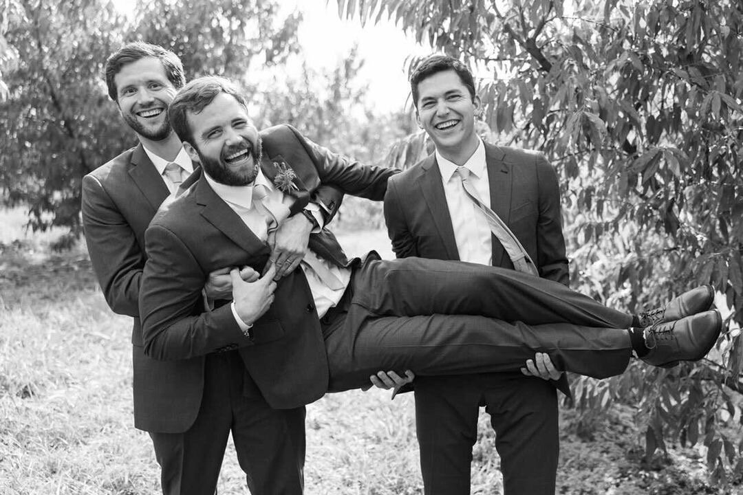 Groom and groomsmen silly wedding photo