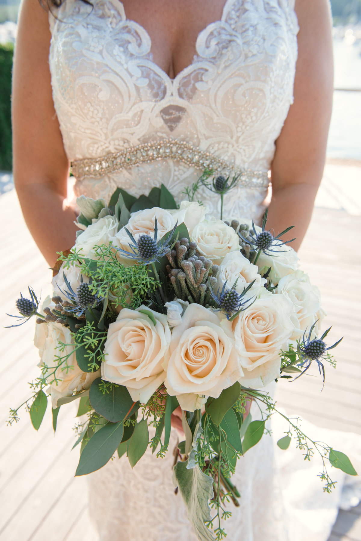 bride-holding-floral-bouquet-at-prime