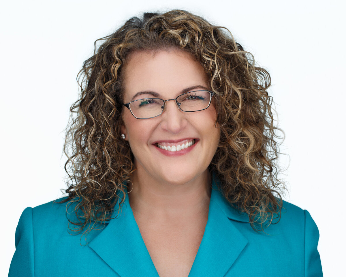 curly-hair-natural-curls-glasses-blue-jacket-woman-small-business-owner-entrepreneur-professional-canon-camera-crew-north-denver-thornton-boulder-lafayette-broomfield-linkedin-salary-hire-me-author-consultant-camera-Yvonne-Min-Photography-Headshot-23