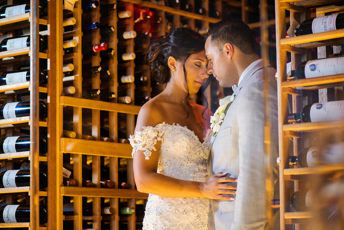 Bride and Groom inside the wine cellar