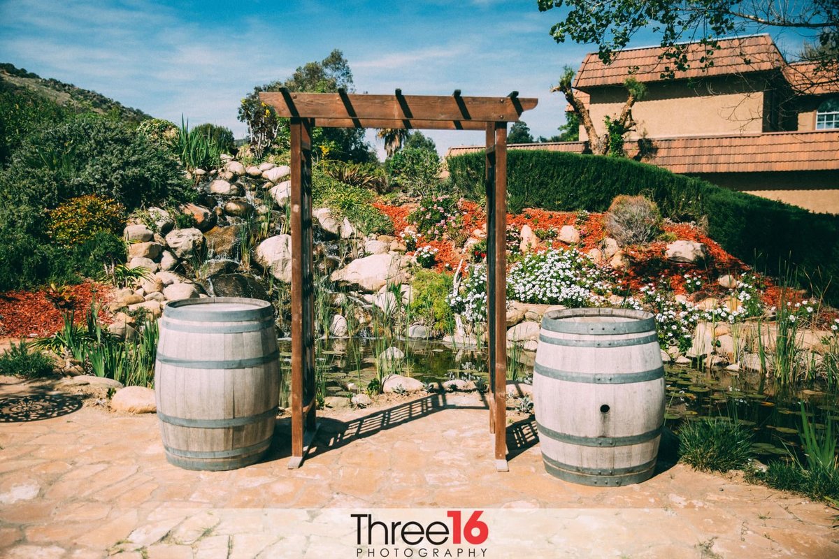 Barrels at the entrance of the Harmony Estate Wedding Venue in Murrieta