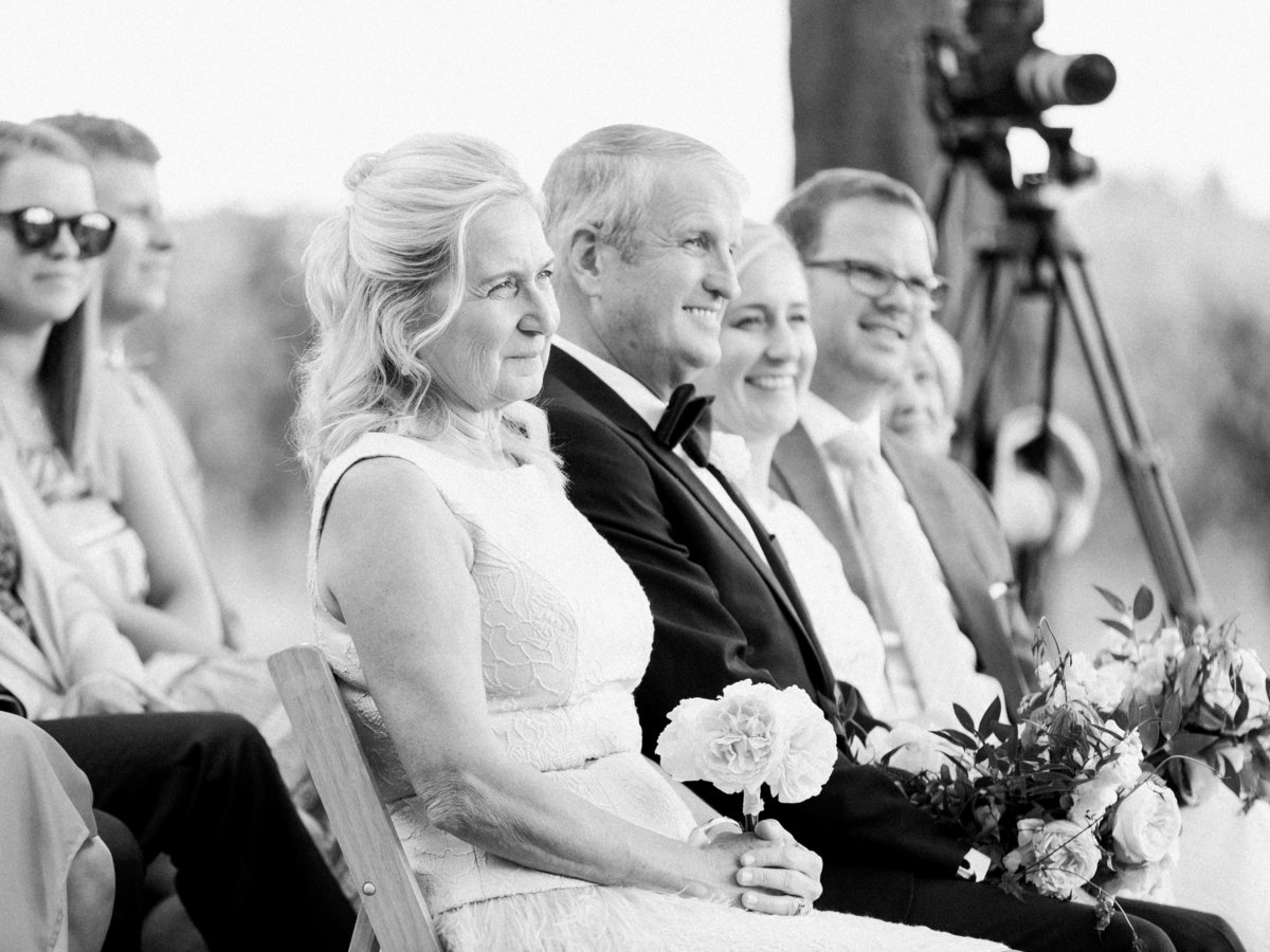 parents of the bride watching the wedding ceremony