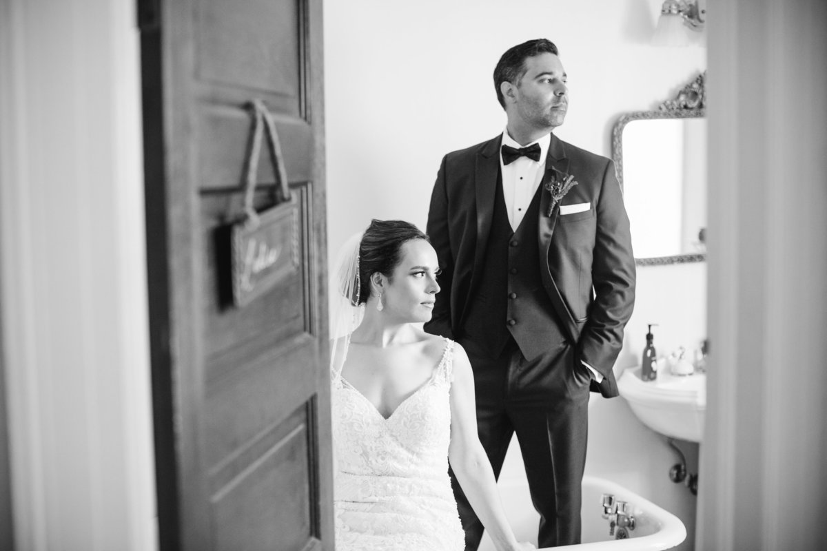 bride and groom in bathtub at water witch club wedding