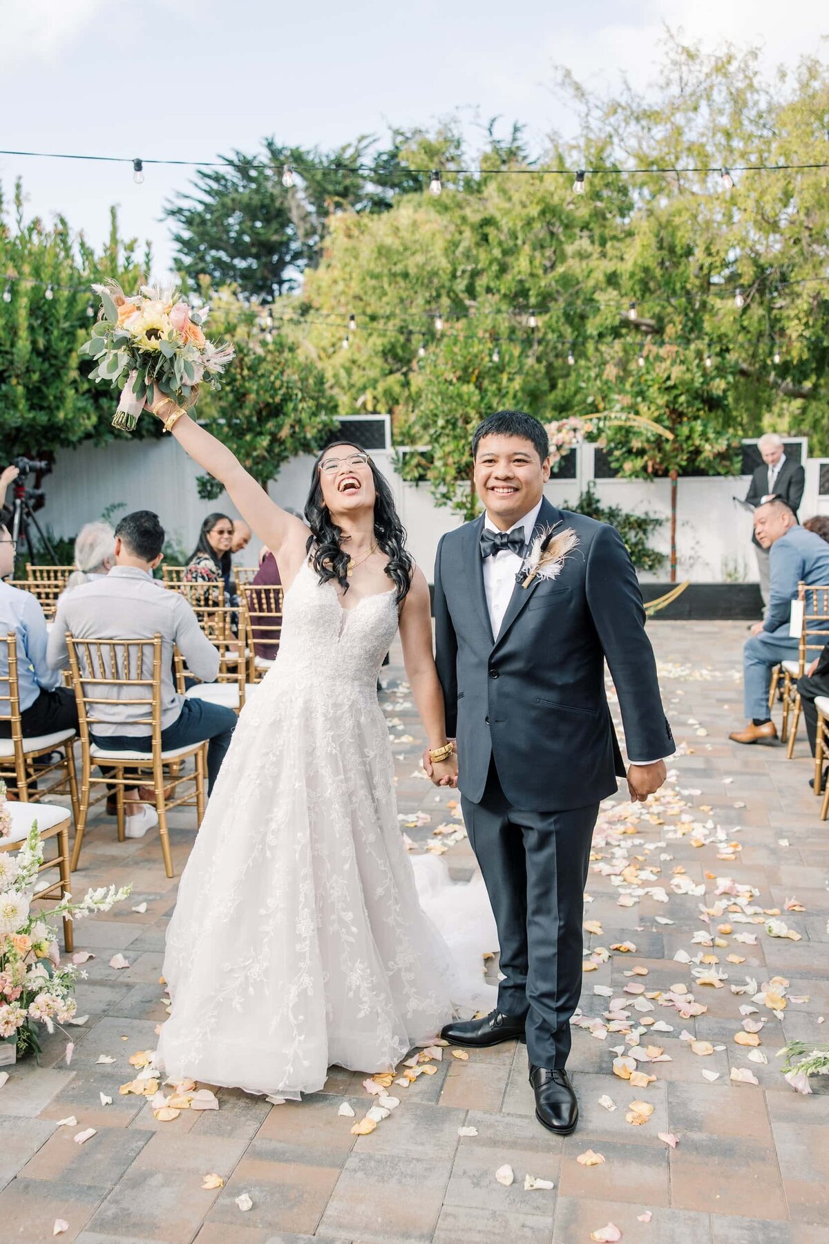 Bride and groom aisle after ceremony