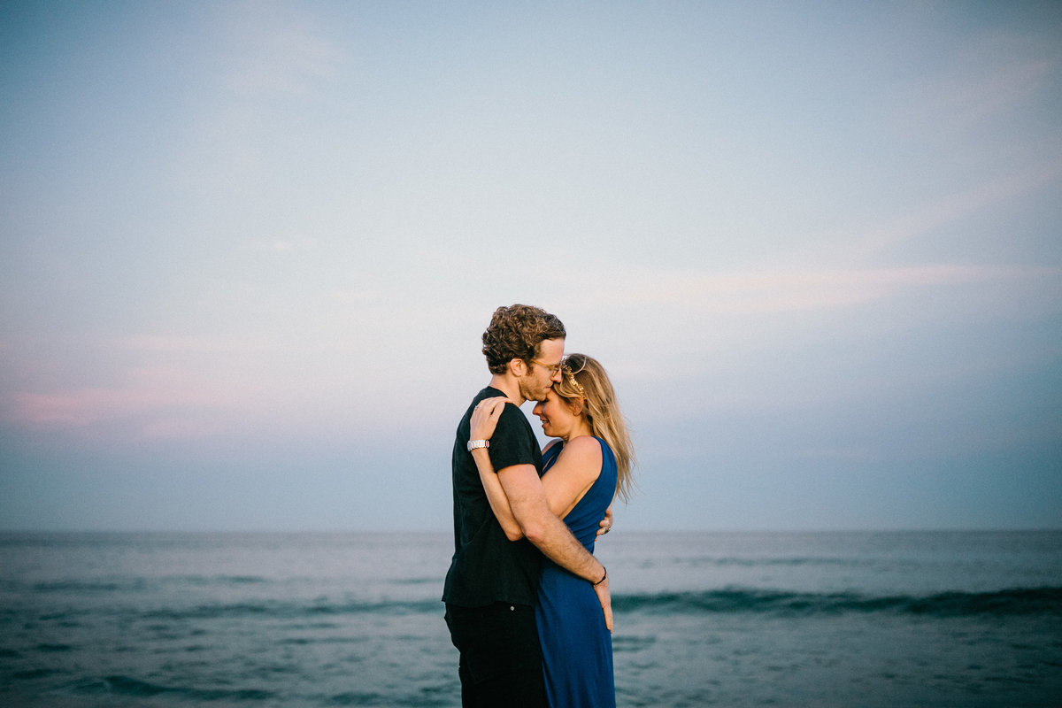Natural light engagement session on Long Island beach, photographed by Sweetwater.