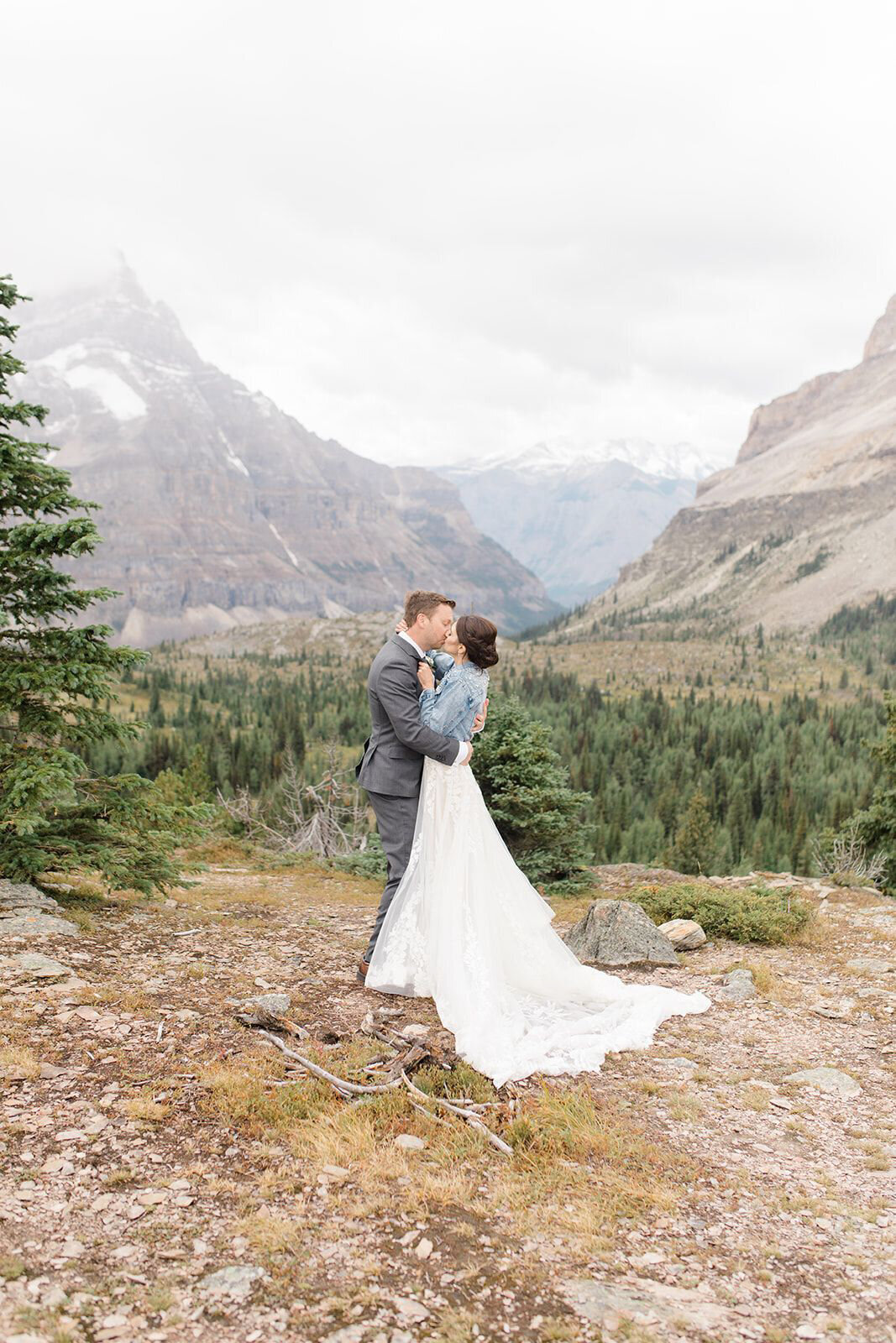 Romantic portrait of couple in mountains captured by Jennifer Chabot Photography, classic and romantic wedding photographer in Calgary,  Alberta. Featured on the Bronte Bride Vendor Guide.