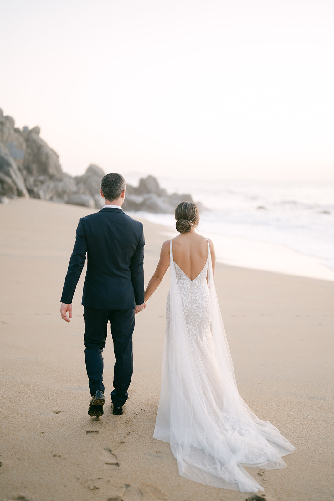 Bride and groom on the beach at One and Only Mandarina Mexico