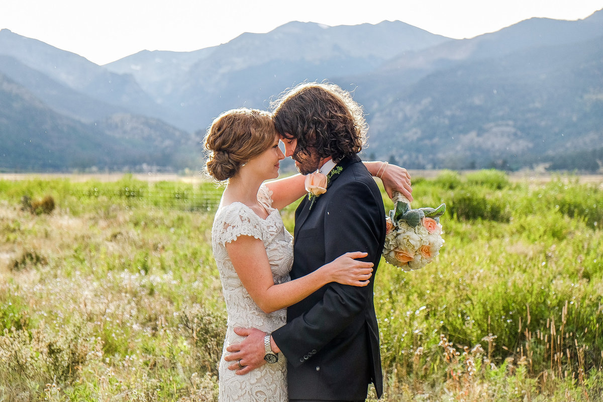 Romantic embrace between bride and groom, Denver wedding photographer