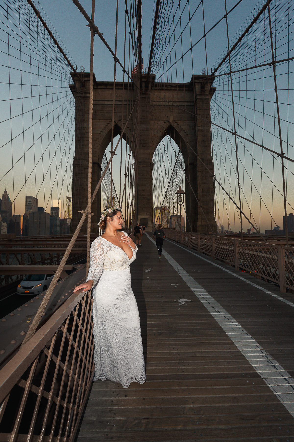 Bride Pictured on the Brooklyn Bridge During Her Brooklyn Wedding Photo Shoot