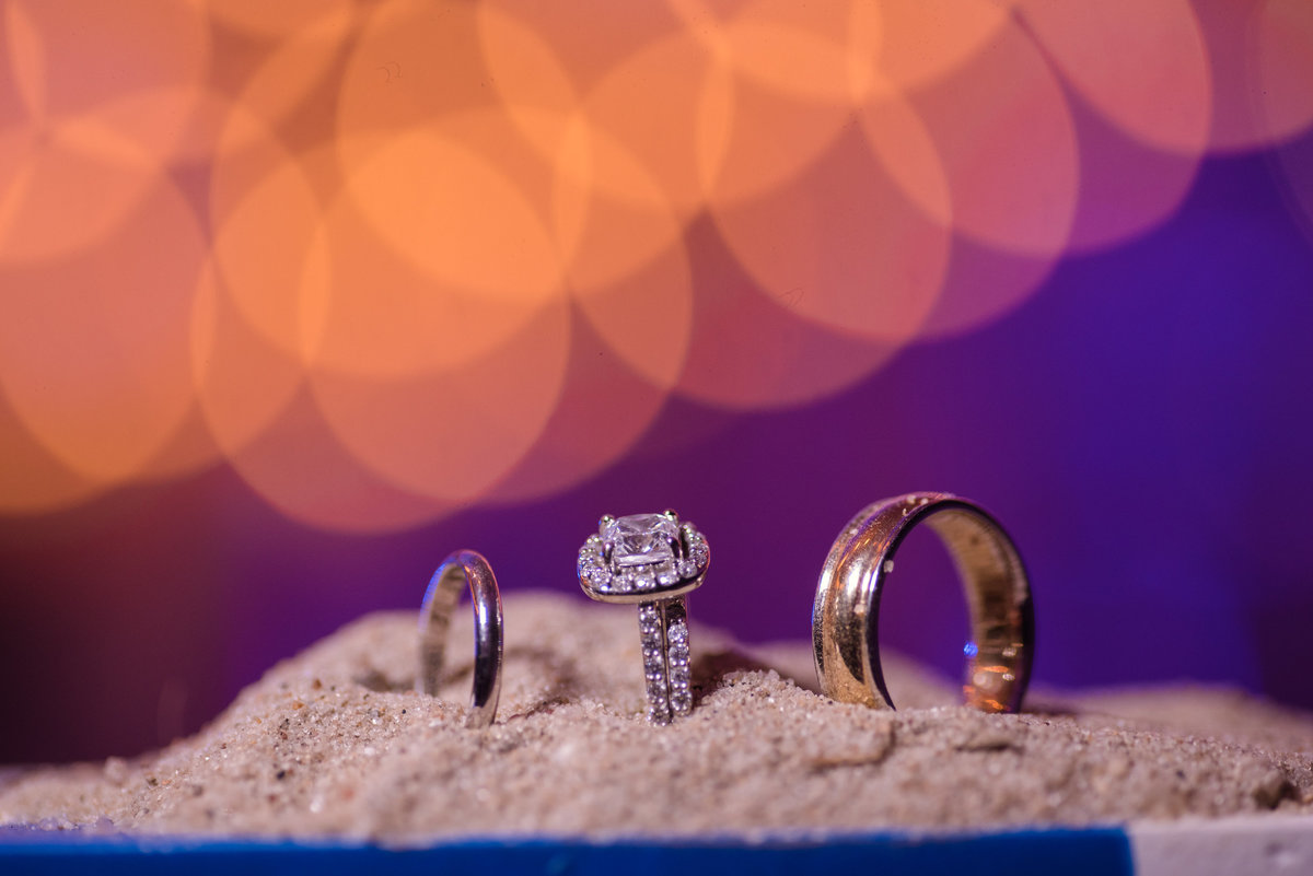 oceanbleu wedding rings on the sand