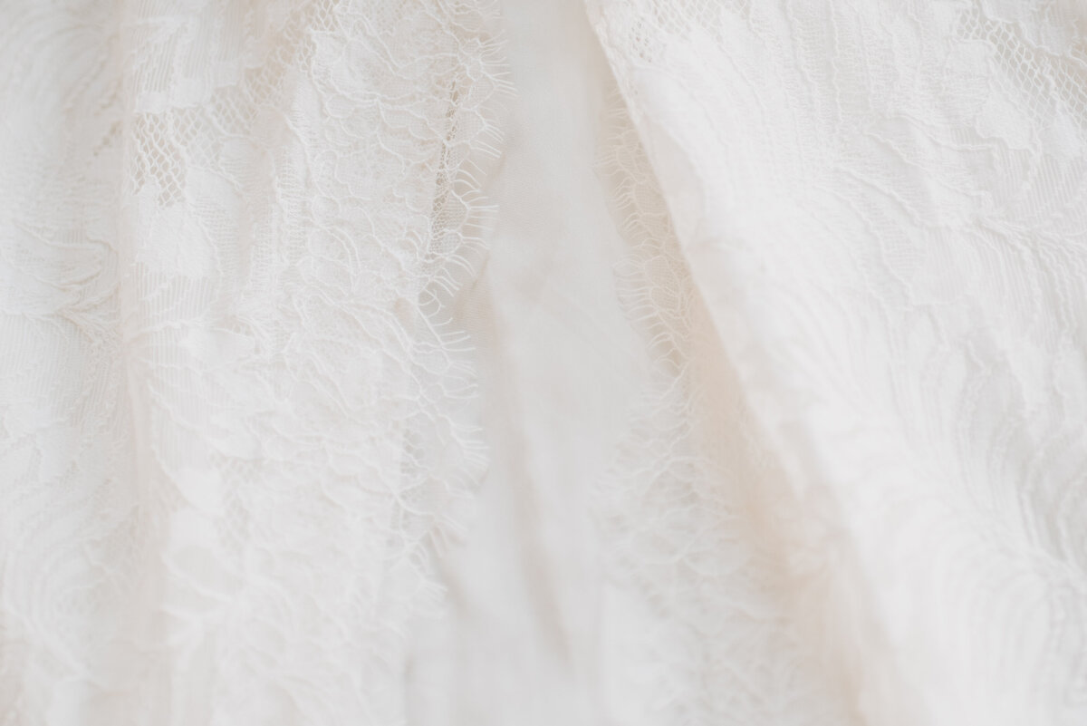 Photographers Jackson Hole capture wedding dress close up before Grand Teton wedding