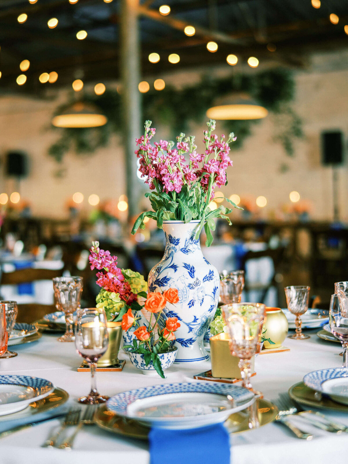 Warm and colorful table centerpieces for wedding at The 4Eleven venue