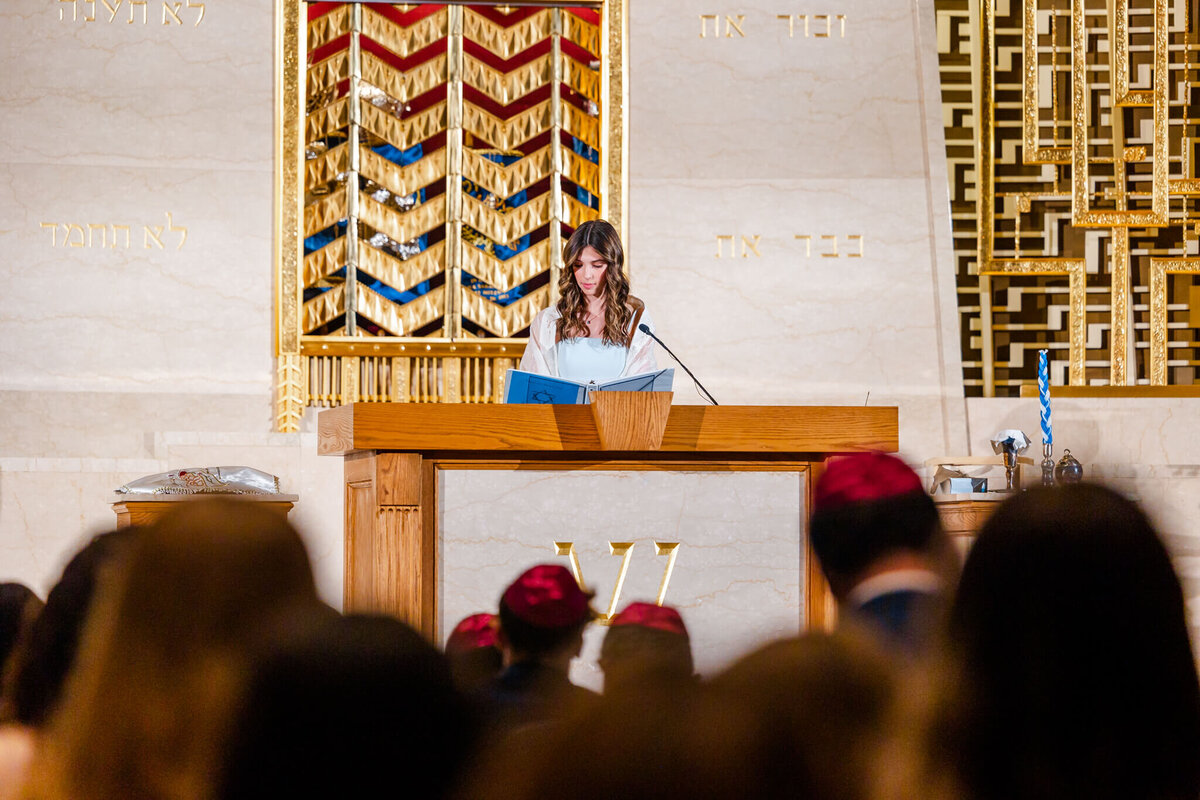 A teenage girl gives her bat mitzvah speech