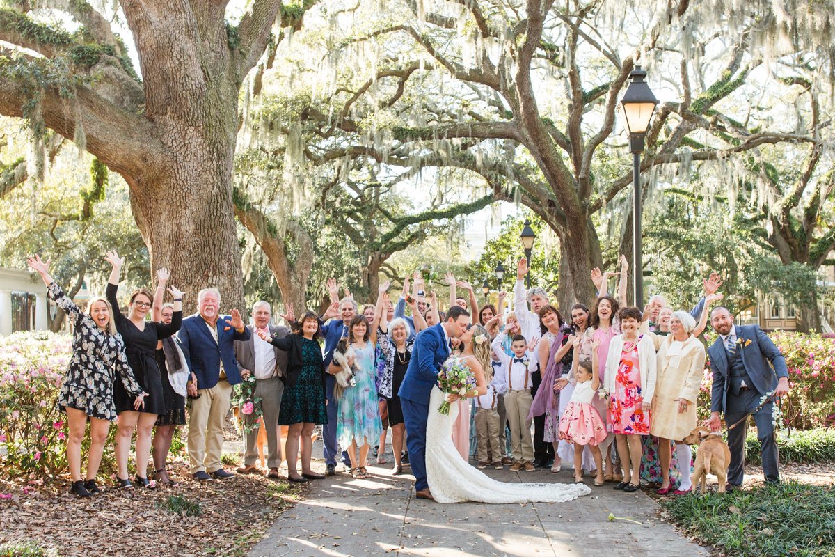 whole family at wedding  in forsyth park