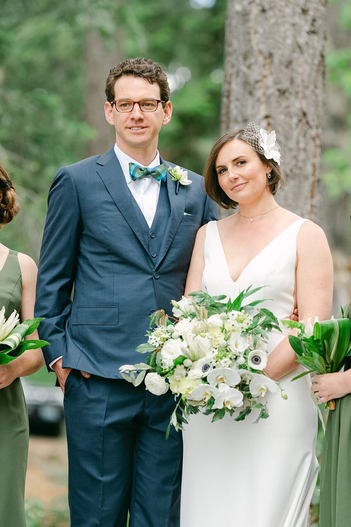 Candid wedding party image with bride and groom