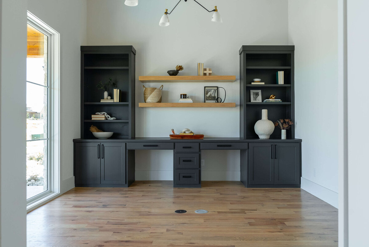Dark grey custom cabinets inside study