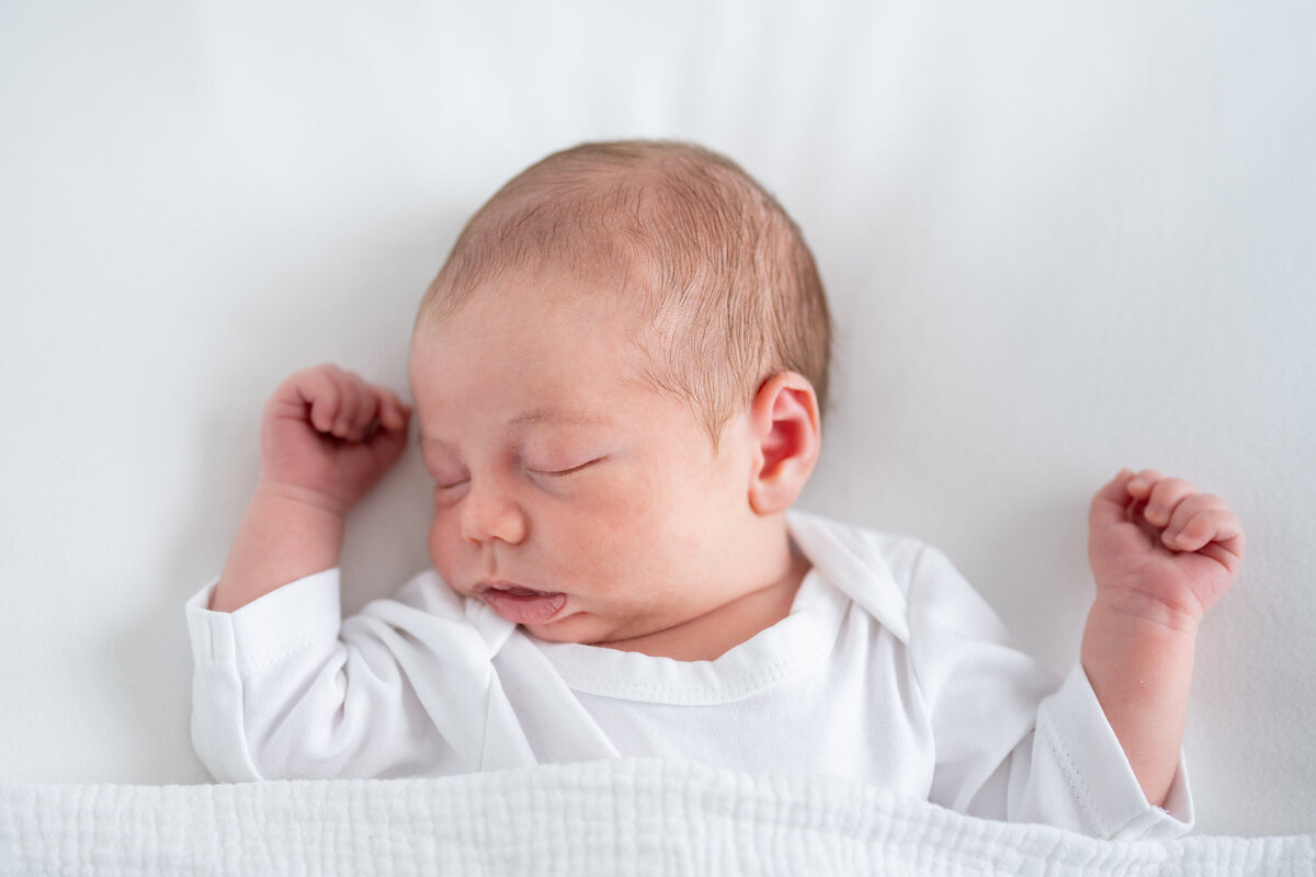 A sleeping newborn baby