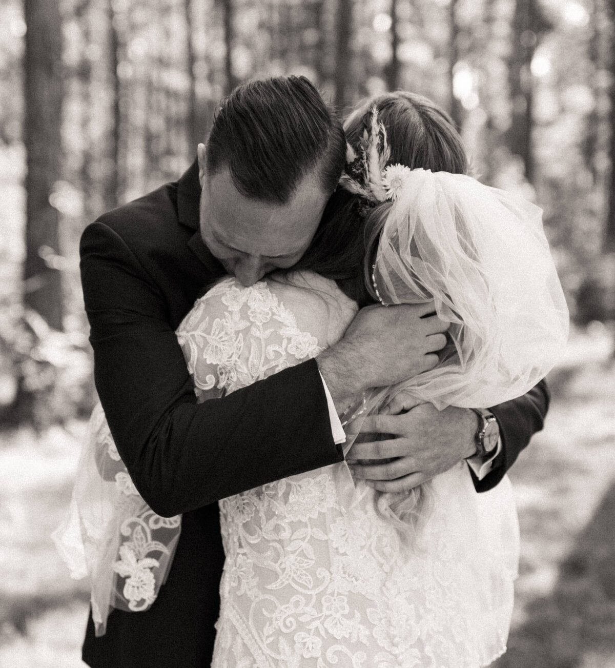 Special moment of an emotional groom holding his bride