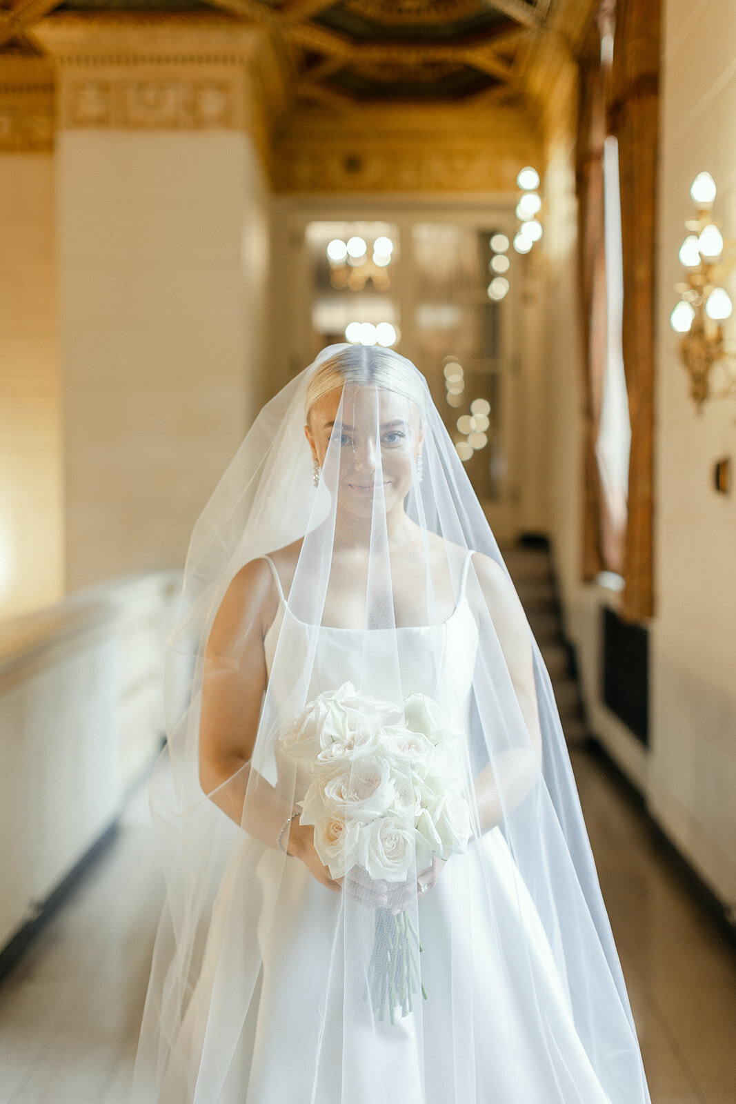 Bride and groom celebrating at the Omni William Penn Hotel wedding in Pittsburgh