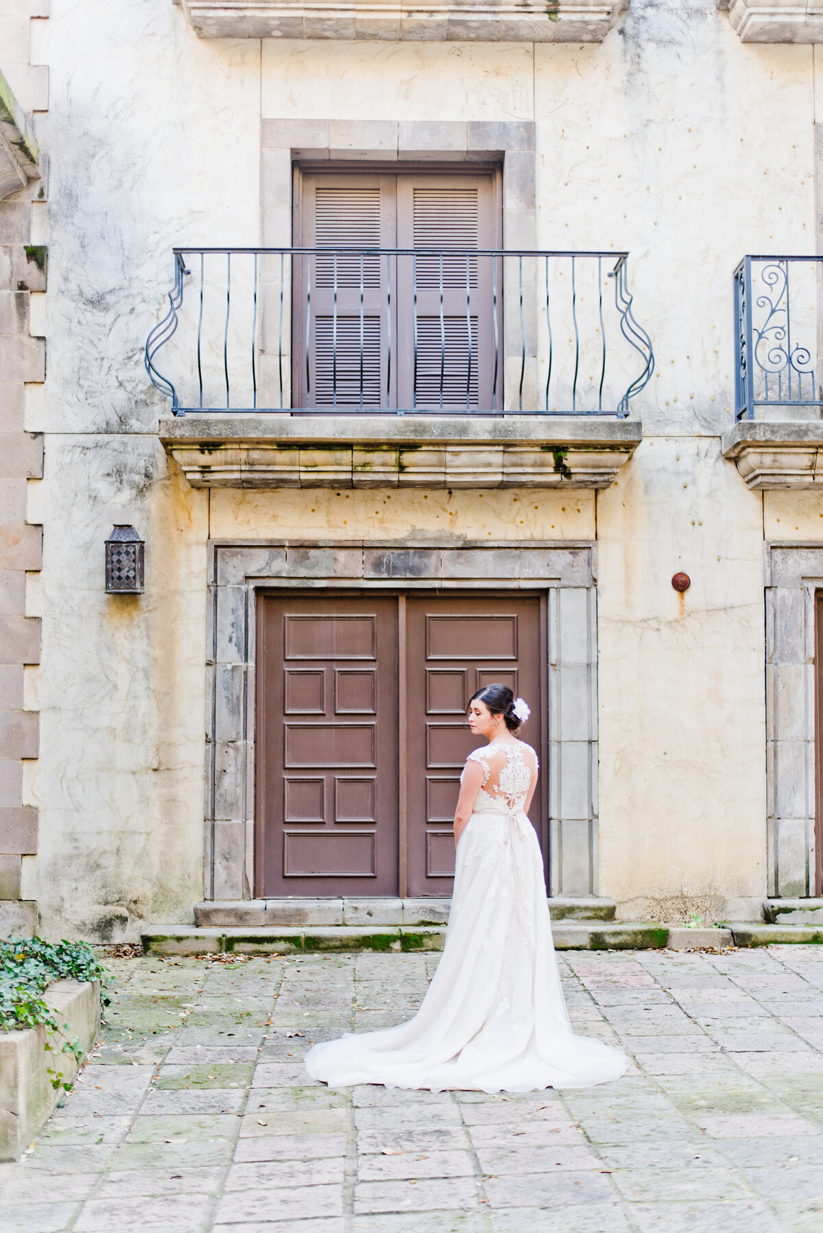 Bride standing in front of Fort Worth wedding venue