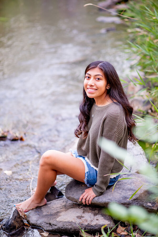 high-school-senior-dark-haired-girl-near-river-cherry-creek