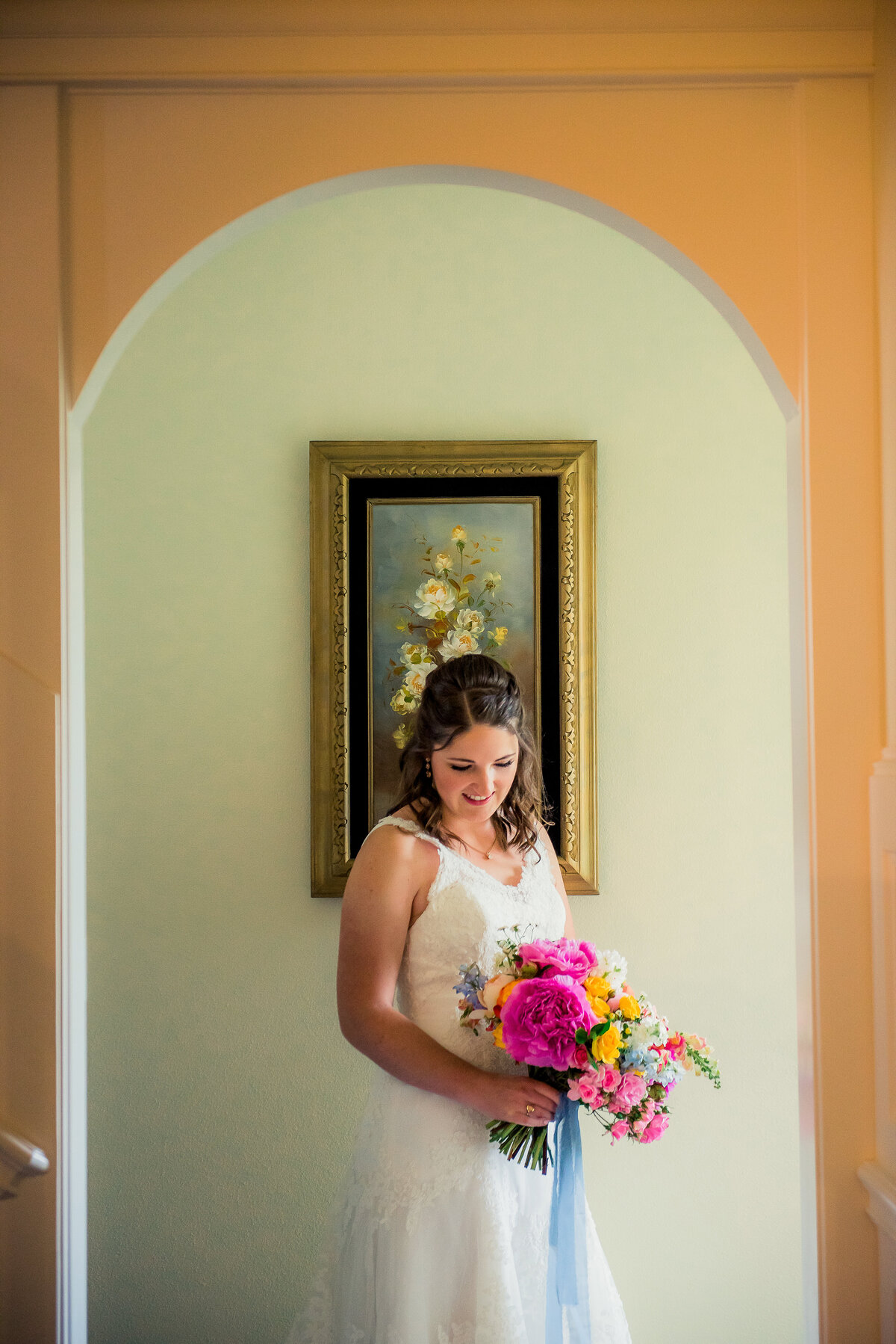 bride pausing in doorway