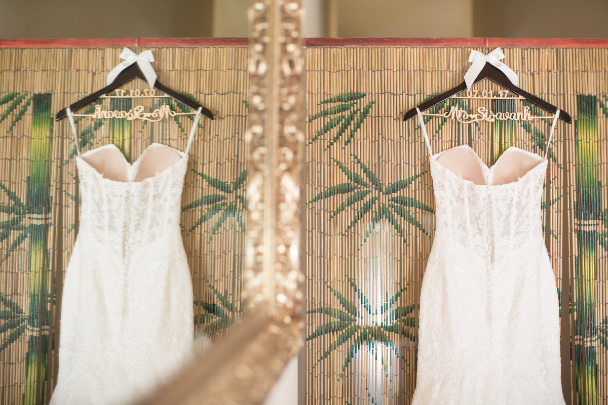 A reflection of the brides dress in the mirror for a detail photo.