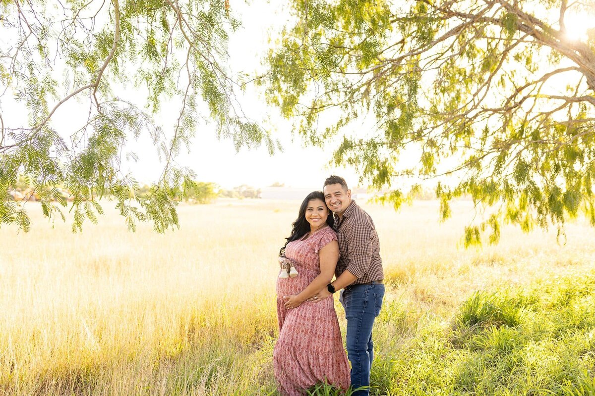 Maternity outdoor portrait husband and wife
